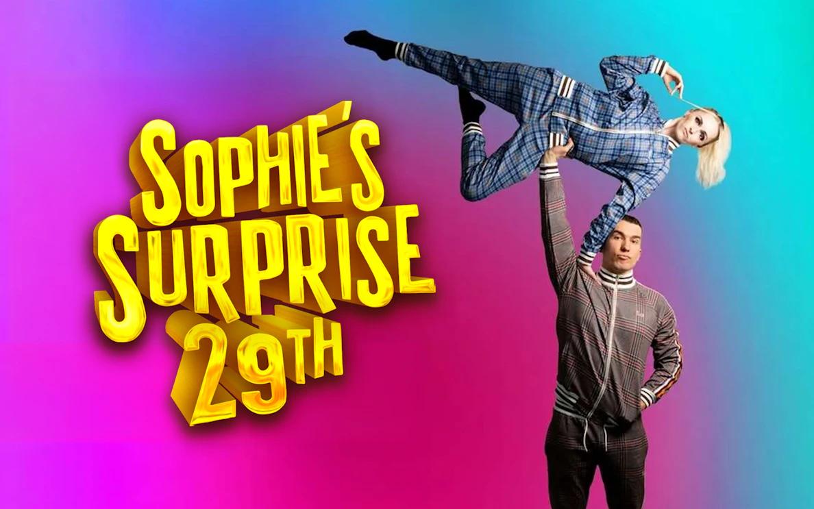 Acrobat lifting performer in plaid outfit, "Sophie's Surprise 29th" text on colorful background.