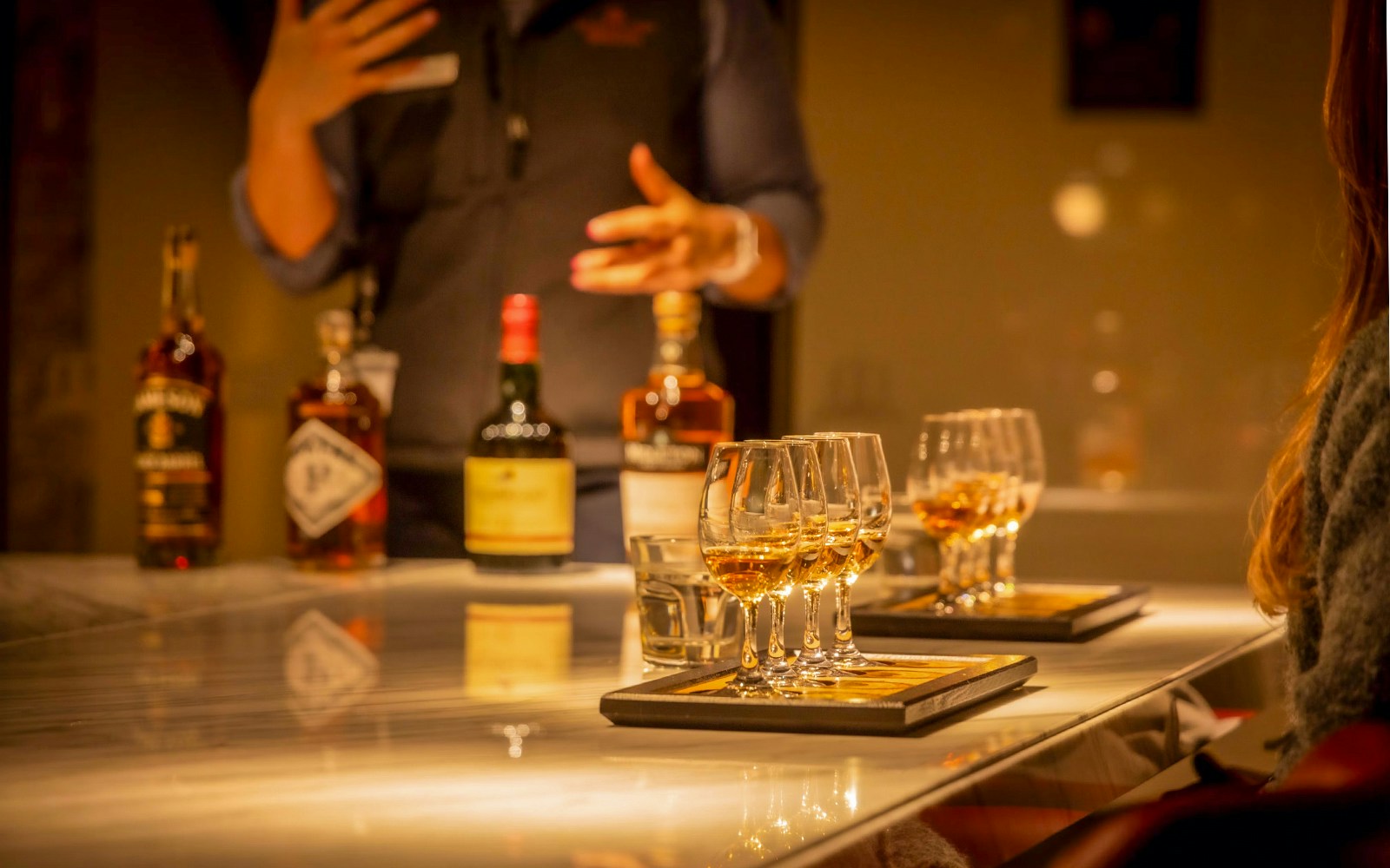 Midleton Distillery whiskey tasting experience with Jameson barrels and glasses.