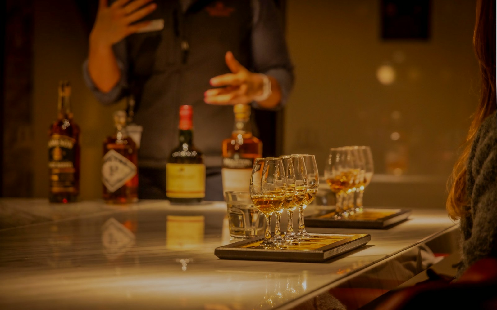 Midleton Distillery whiskey tasting experience with Jameson barrels and glasses.