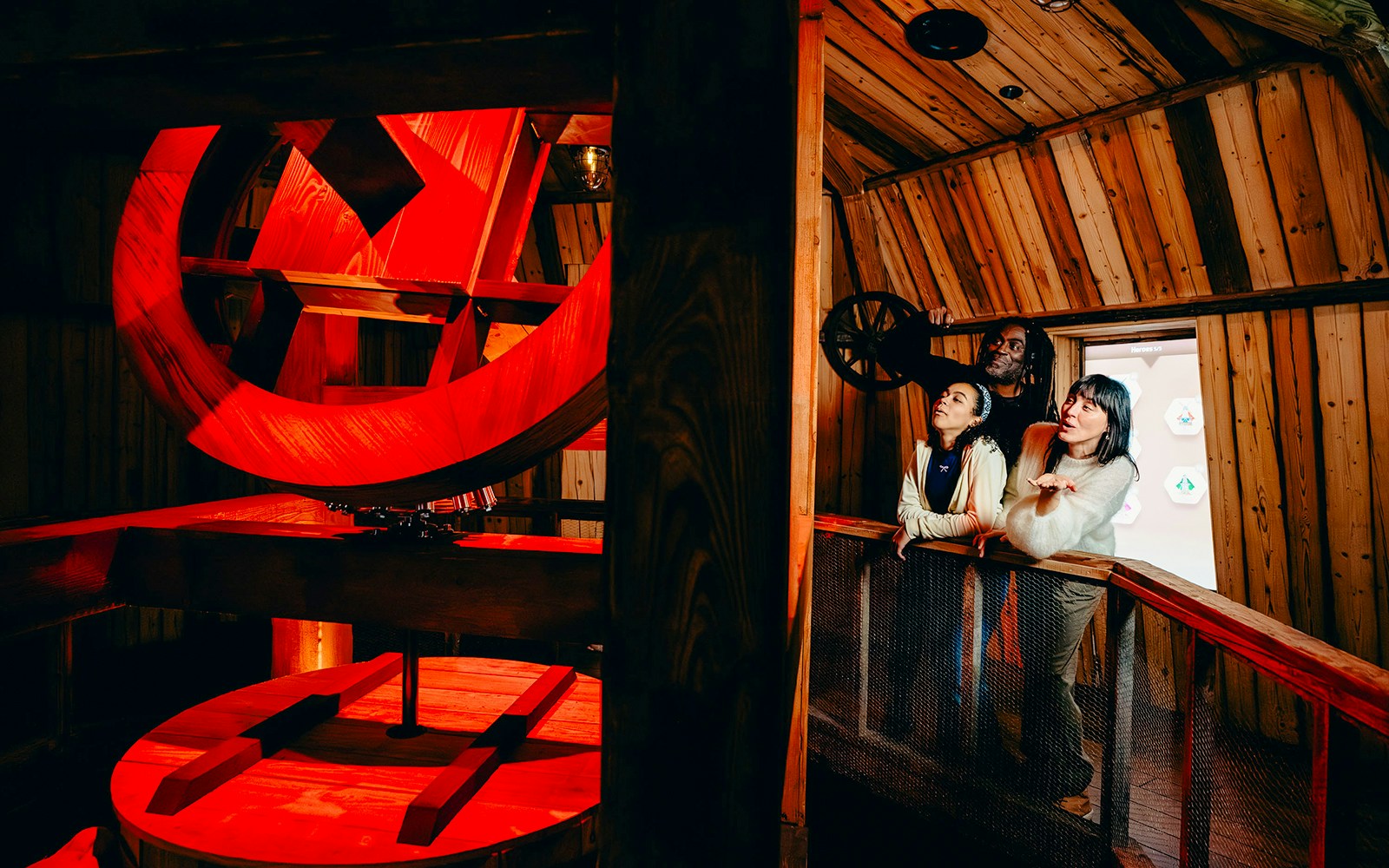 Guests observing windmill interior on Highlights of Holland tour.