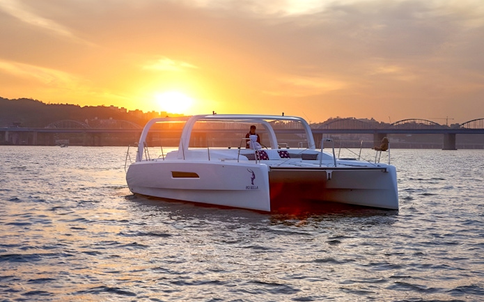 Yacht on Han River at sunset during Marina YachtBoat Experience.