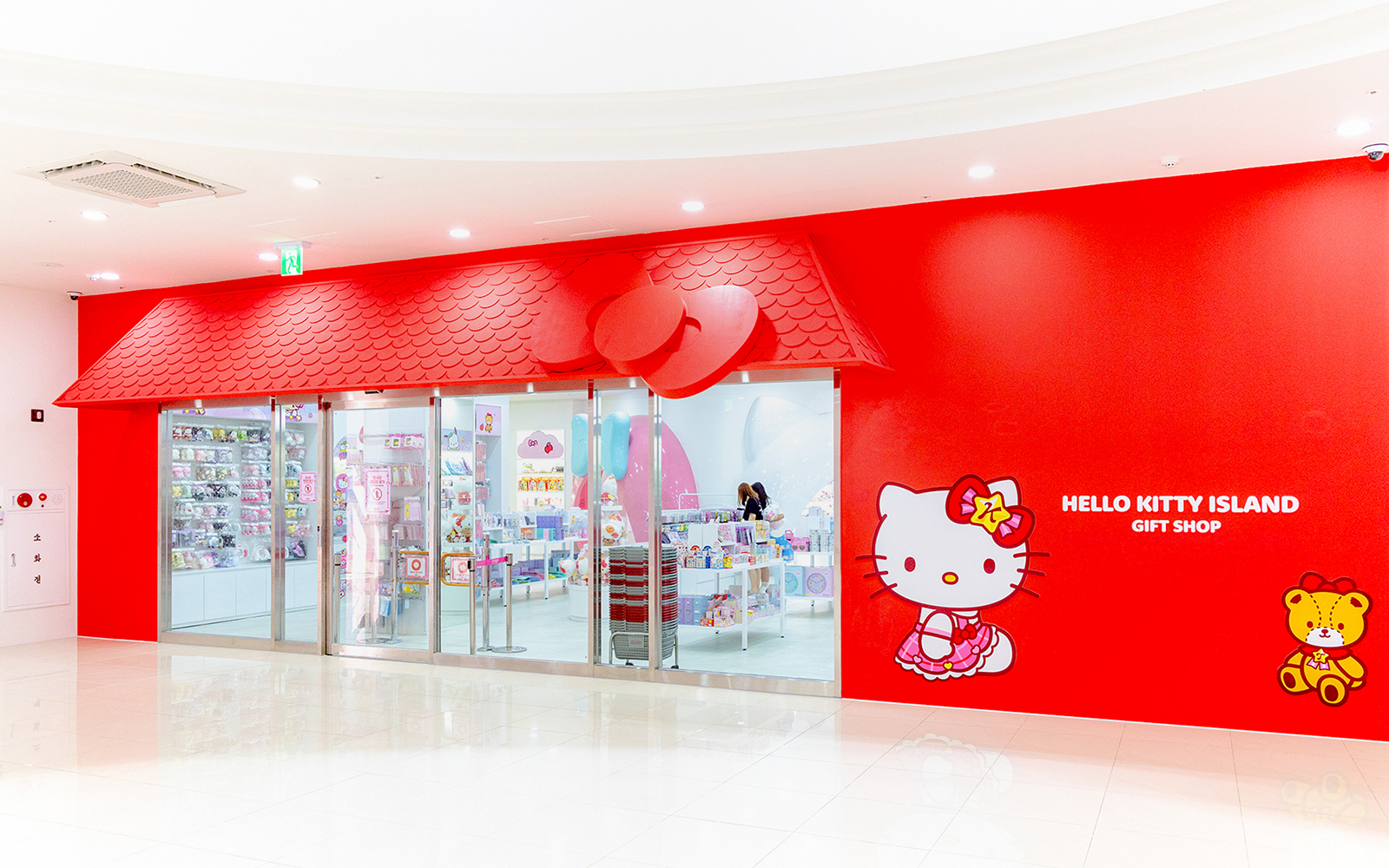 Hello Kitty Island gift shop entrance with merchandise displays inside.