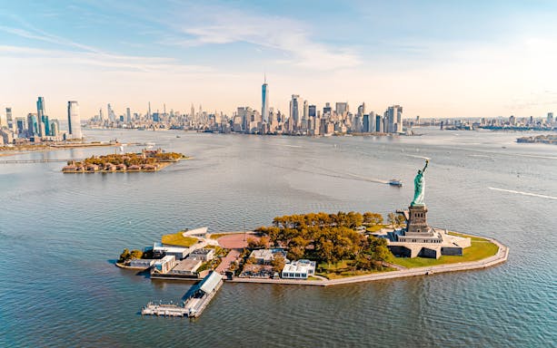 Statue of Liberty and Manhattan skyline from a New York helicopter tour.