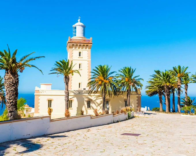 From Tangier: Cap Spartel and Hercules Caves Shared Group Tour with Camel Riding