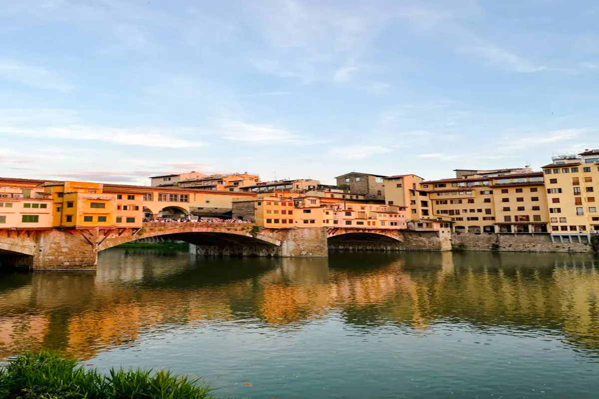 Ponte Vecchio over the Arno River at sunset, Florence Renaissance Highlights tour.