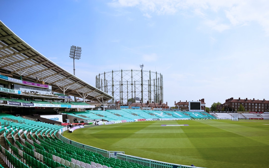 Kia Oval Stadium in London with empty stands and cricket field.