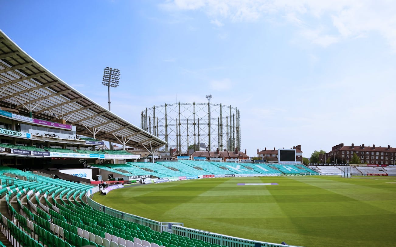 Kia Oval Stadium in London with empty stands and cricket field.