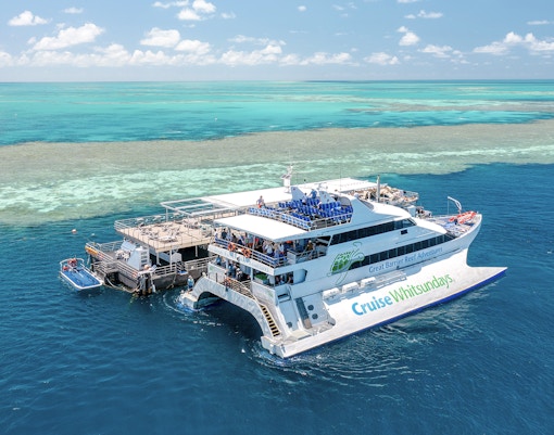Cruise Whitsundays boat docked at pontoon, Great Barrier Reef.