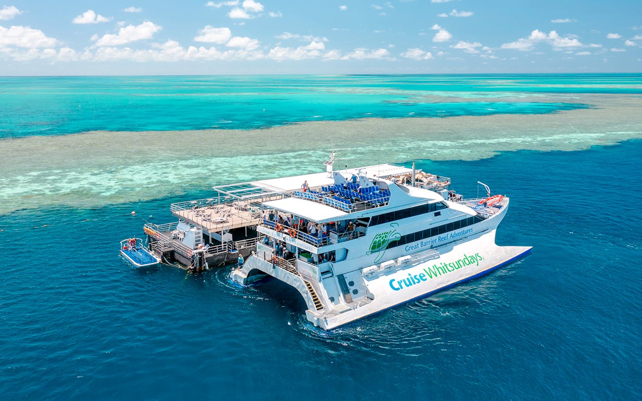 Cruise Whitsundays boat docked at pontoon, Great Barrier Reef.