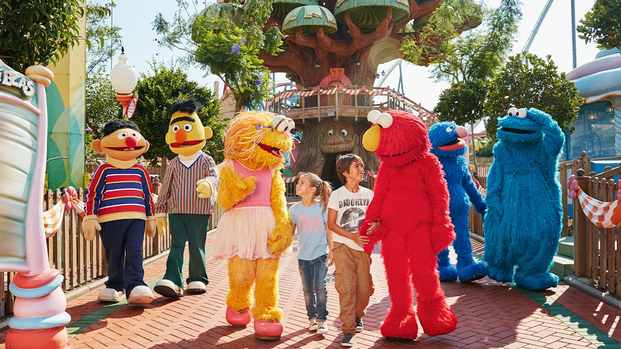 Children riding a roller coaster at PortAventura World, Barcelona.