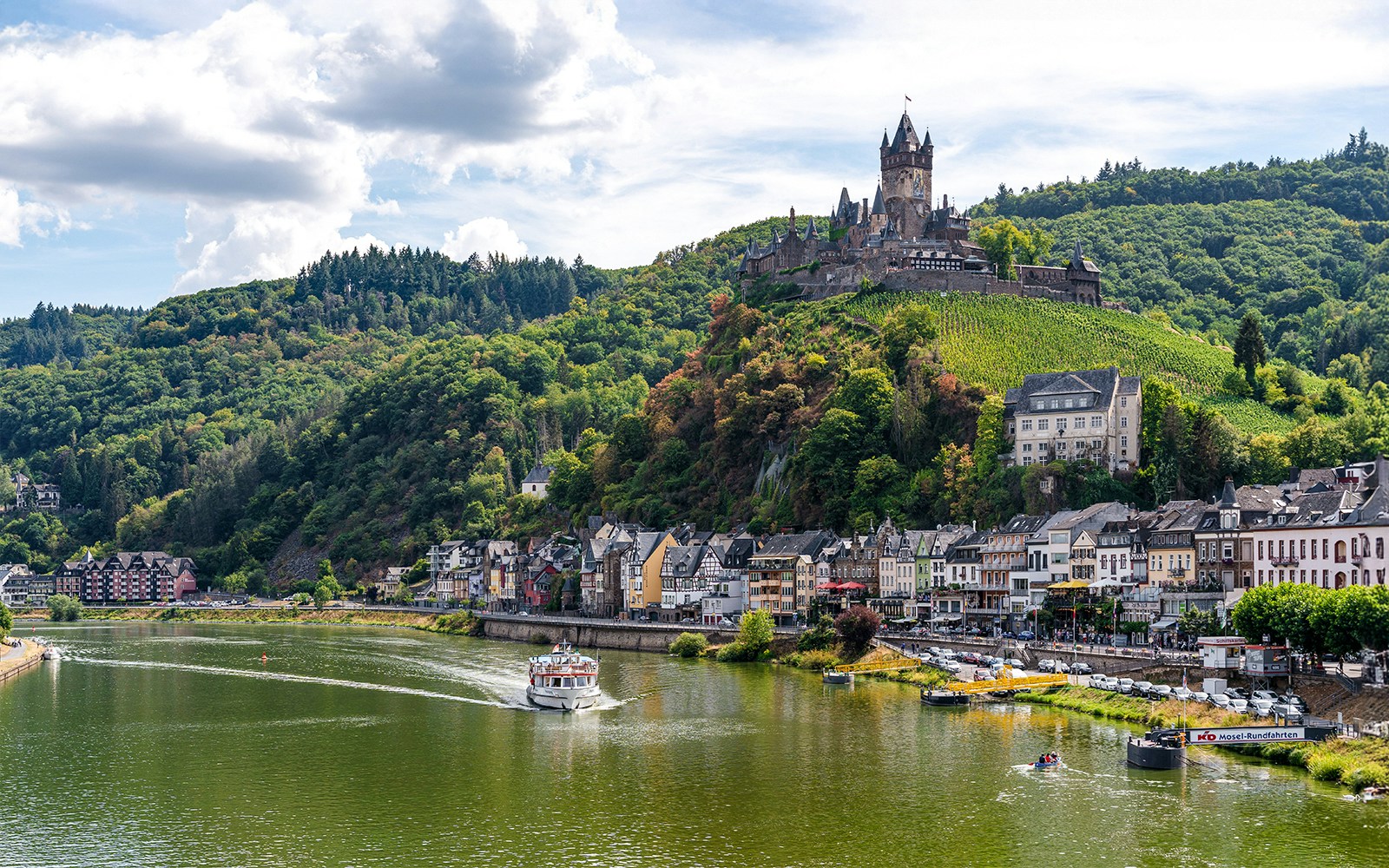 Cochem town and Reichsburg Castle viewed from a 1-hour panorama cruise on the Moselle River, Germany.