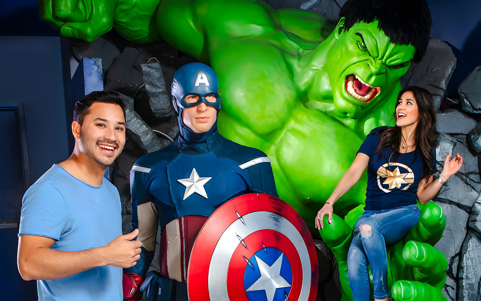 Captain America and Hulk wax figures at Madame Tussauds Las Vegas with visitors.