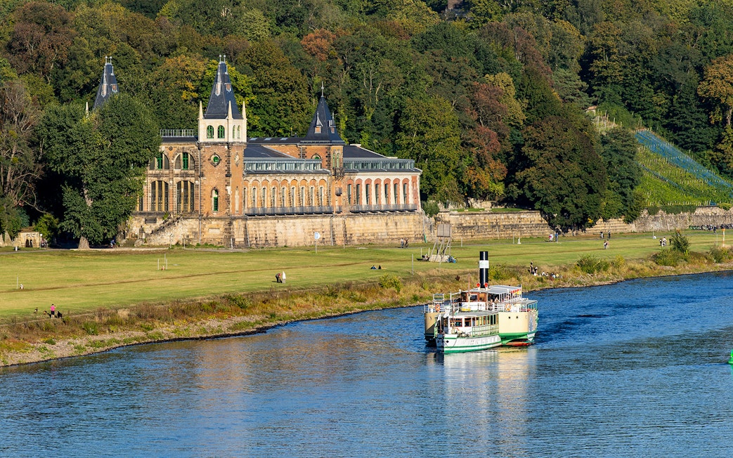 Steamboat cruising on the Elbe River near Pillnitz Castle, Dresden.