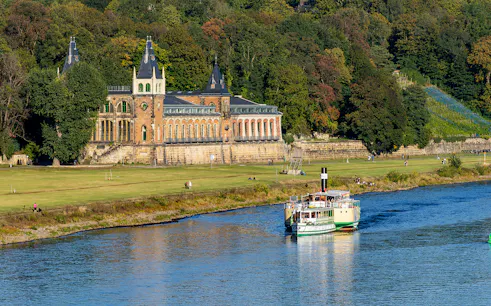Steamboat cruising on the Elbe River near Pillnitz Castle, Dresden.