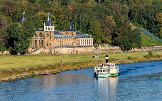 Steamboat cruising on the Elbe River near Pillnitz Castle, Dresden.