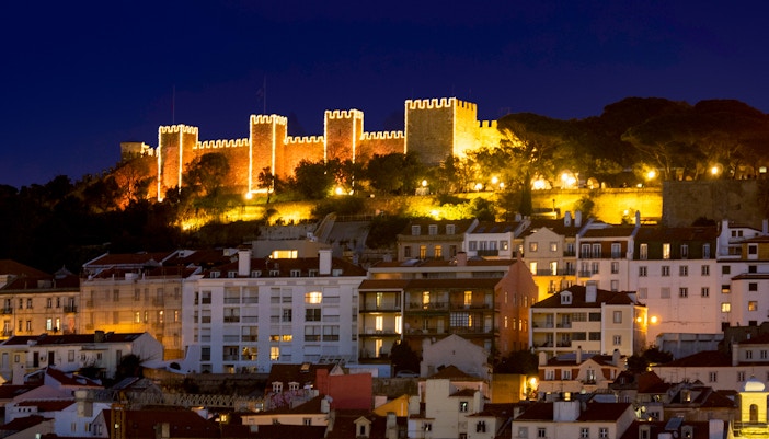 Sao Jorge castle illuminated at night for Christmas