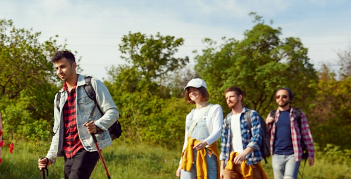 A group of tourists exploring Melbourne on a guided walking tour