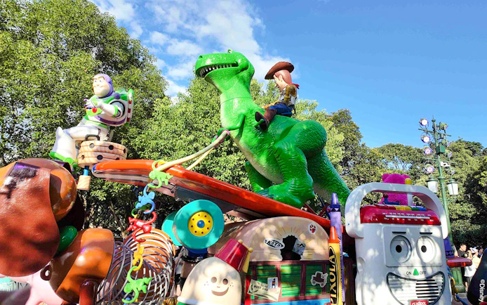 Toy Story characters on parade float at Shanghai Disneyland attraction.
