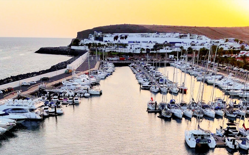 Marina with yachts at sunset during Private Dolphin & Whale Watching Cruise, Gran Canaria.