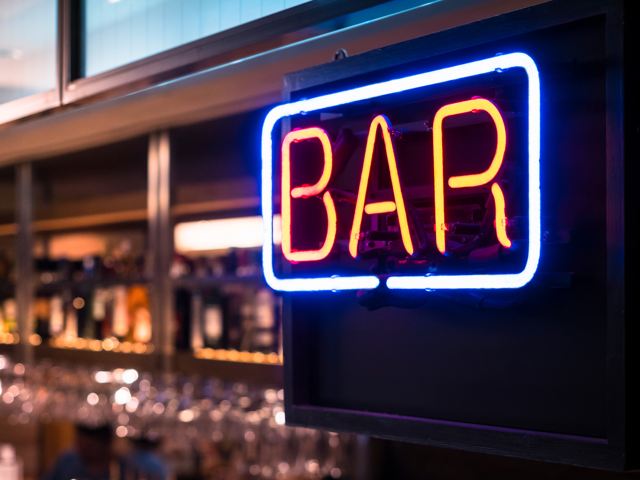 Neon bar sign at Bridge Theatre, London.
