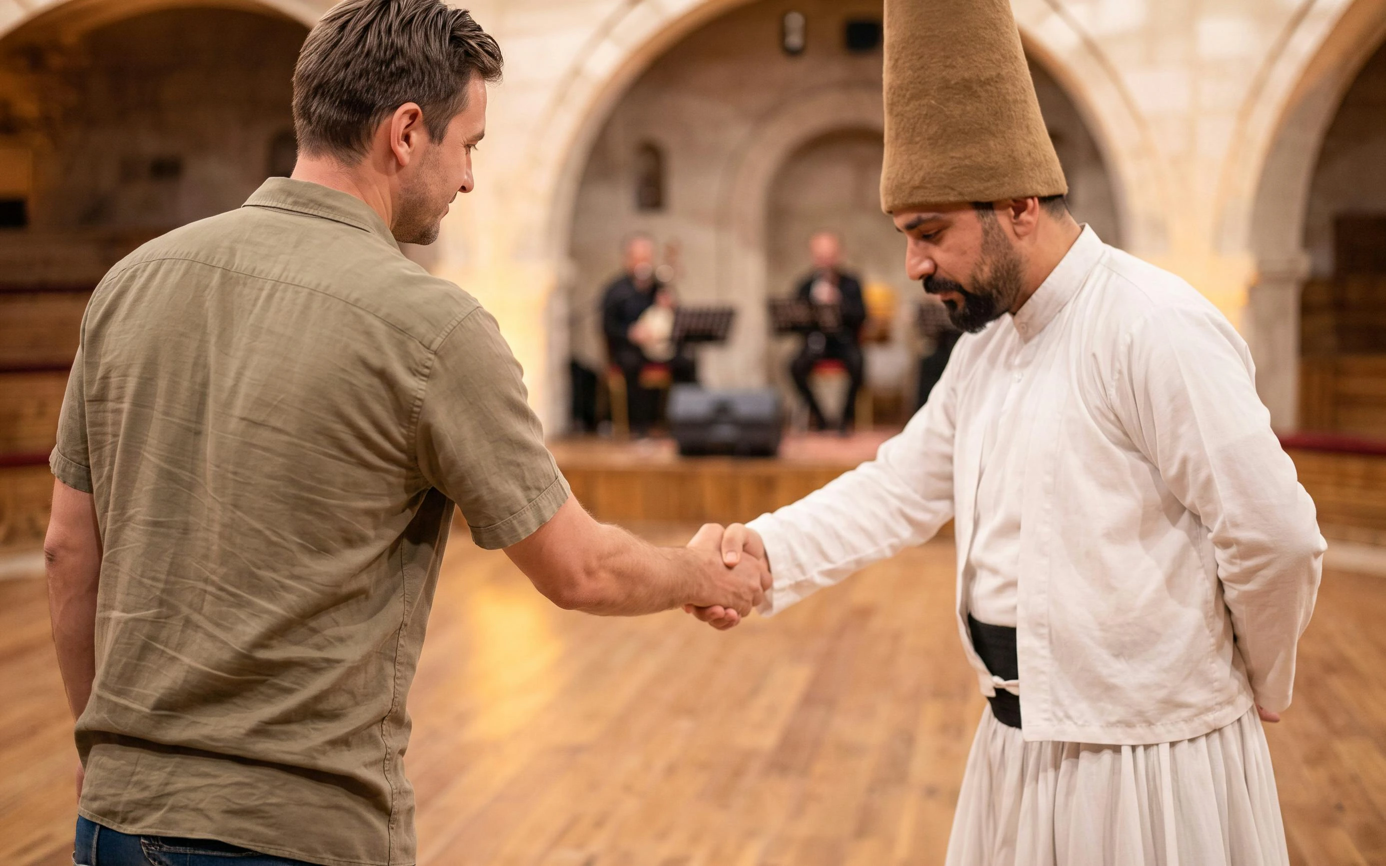 Visitor shaking hands with a whirling dervish performer after a show in Turkey.