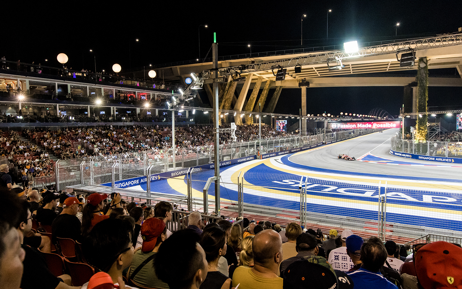 Spectators watching F1 Singapore race from Turn 2 Grandstand.