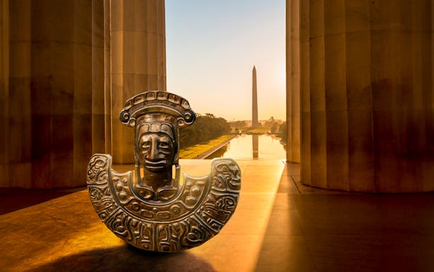 Ancient artifact with Washington Monument in the background, Machu Picchu Journey to the Lost City.