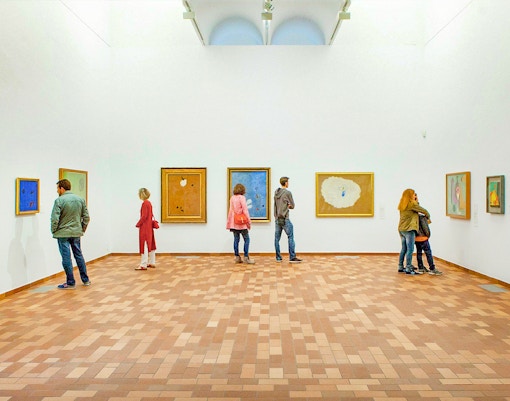 Visitors viewing Joan Miró paintings at the Joan Miró Foundation in Barcelona.