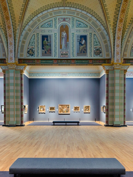 Gallery of Honor at Rijksmuseum featuring classic paintings and ornate architecture.