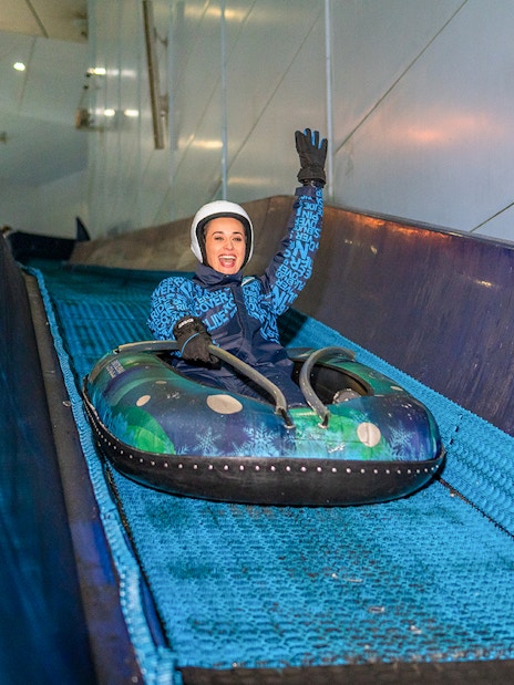 Guest enjoying the 'Mountain Thriller' ride at Ski Dubai.