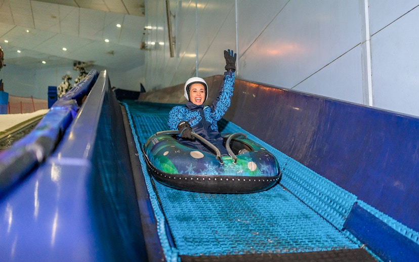 Guest enjoying the 'Mountain Thriller' ride at Ski Dubai.
