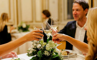 Guests toasting at Imperial Gala Concert, Palais Auersperg, Vienna.
