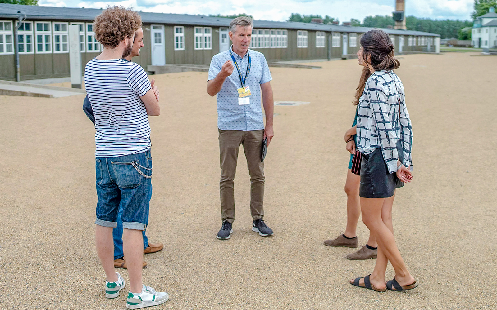 Tour guide leading guests at Sachsenhausen Concentration Camp Memorial.