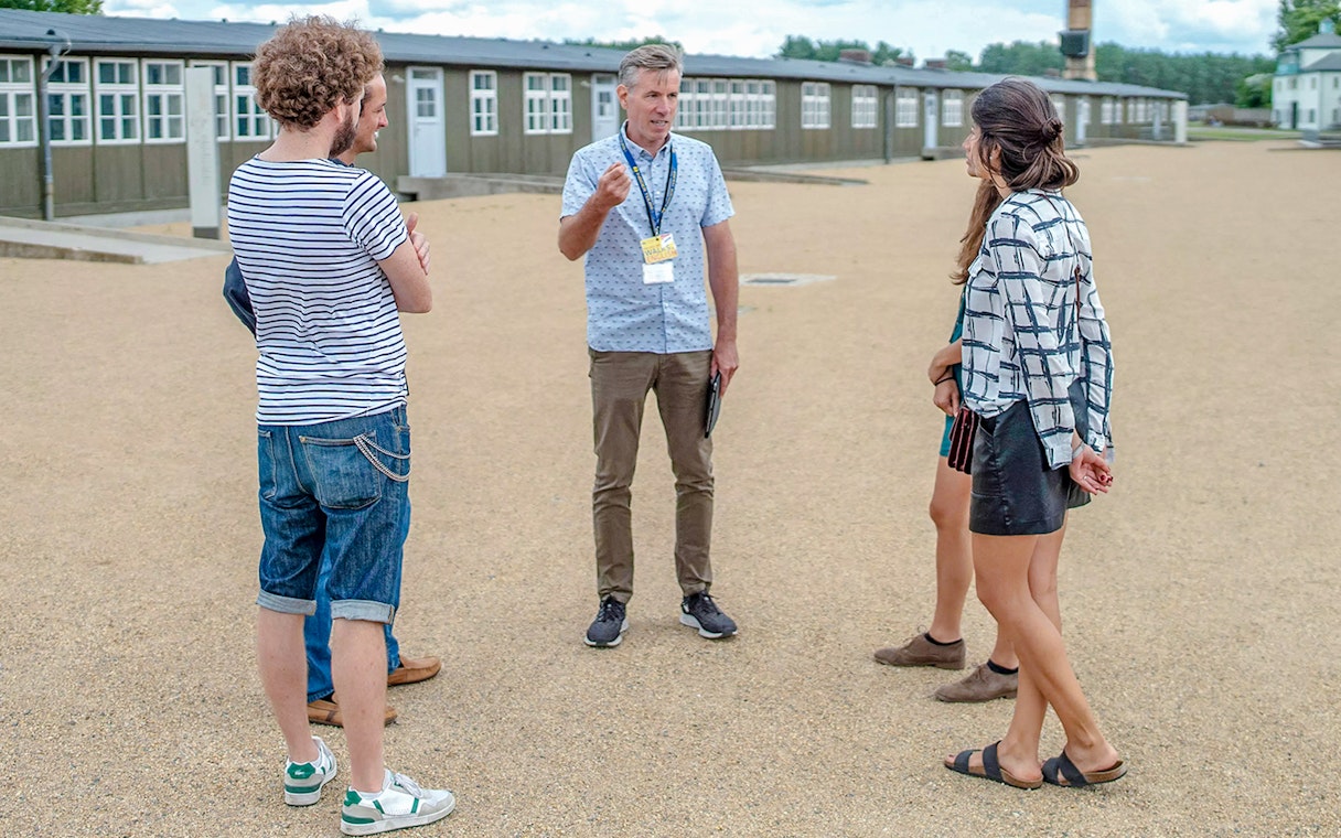 Tour guide leading guests at Sachsenhausen Concentration Camp Memorial.