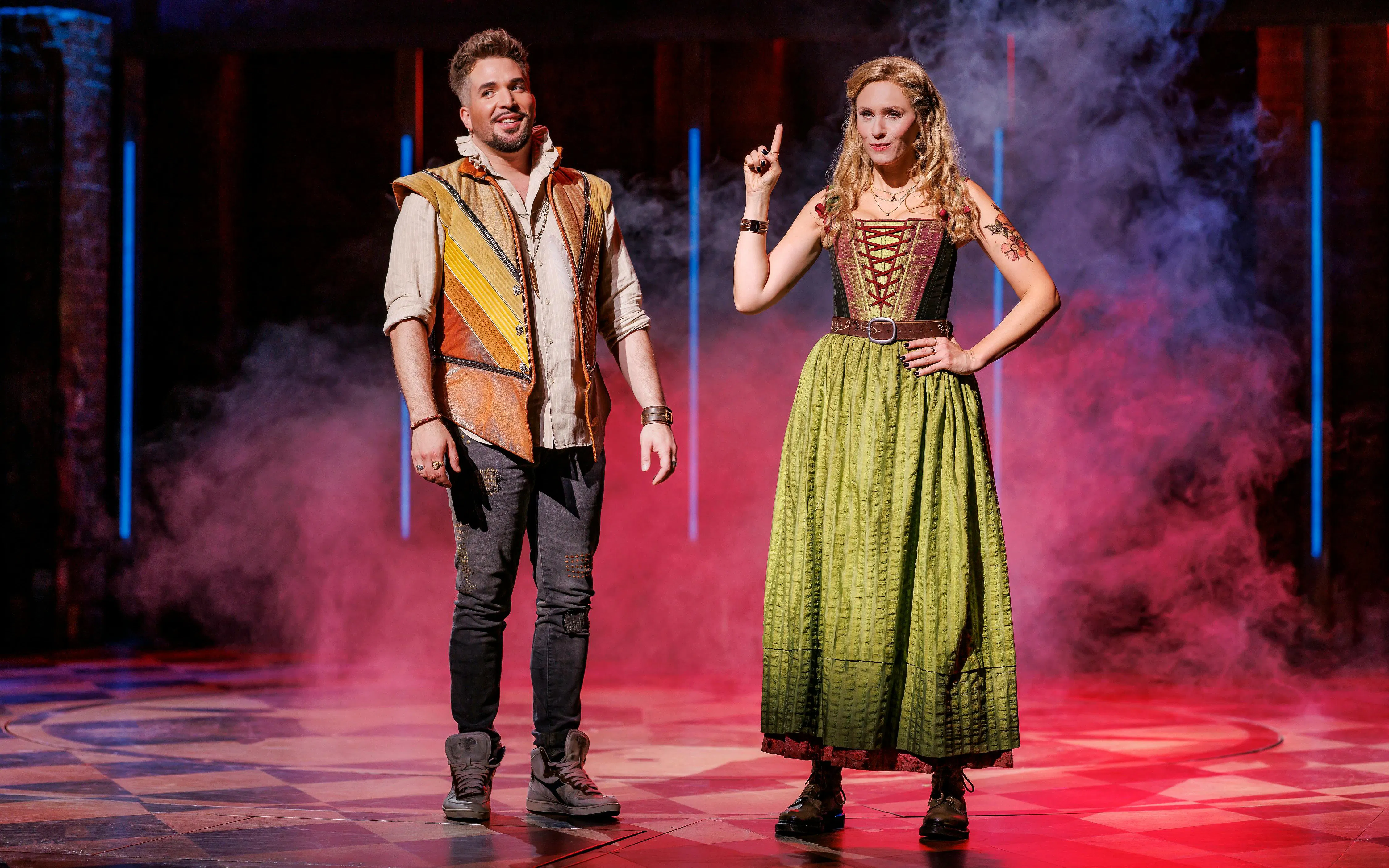 Performance scene from &Julia musical in Hamburg with two actors on stage.