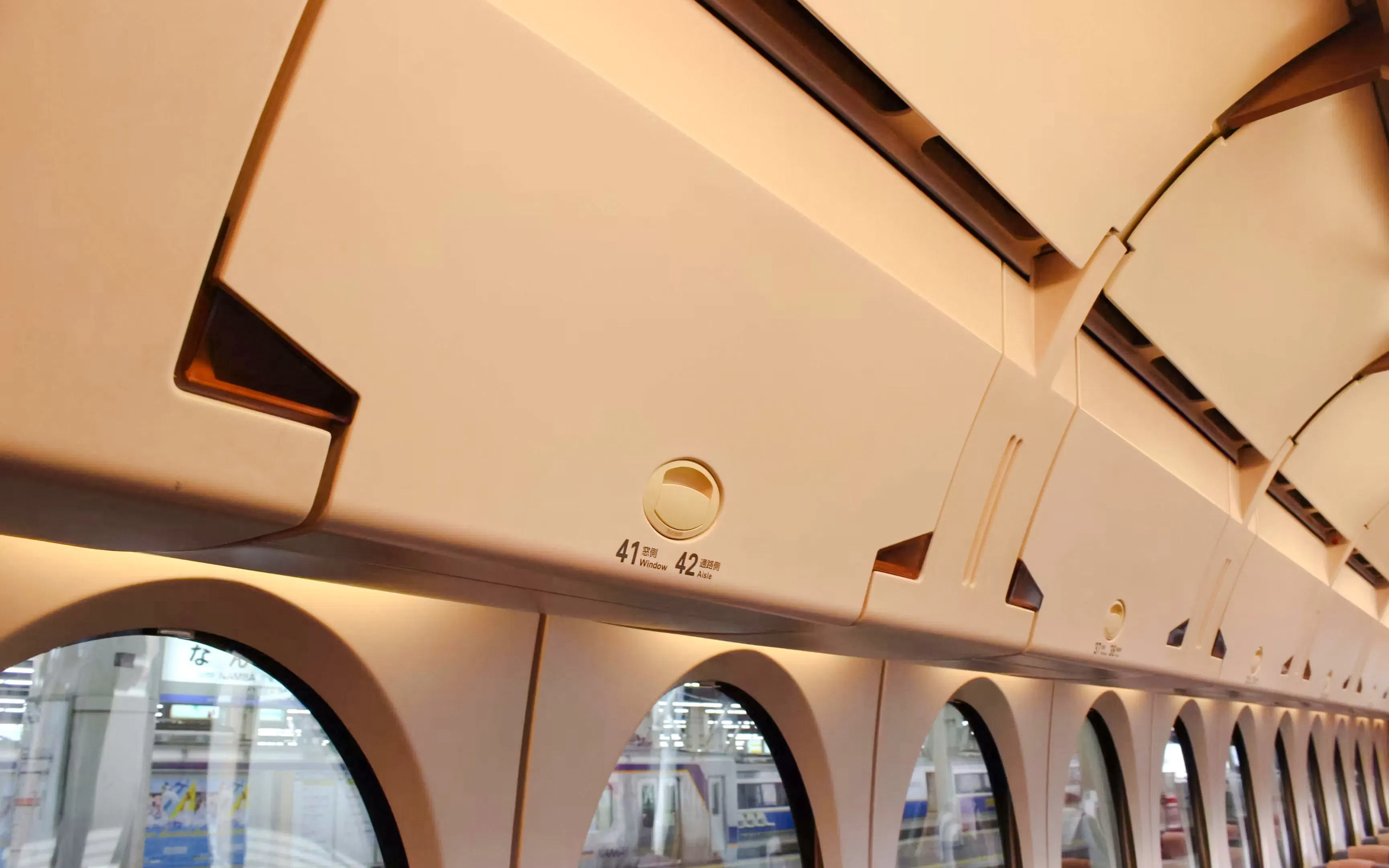Luggage storage area inside Nankai Limited Express train between Kansai Airport and Namba Station.