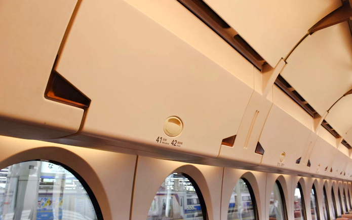 Luggage storage area inside Nankai Limited Express train between Kansai Airport and Namba Station.
