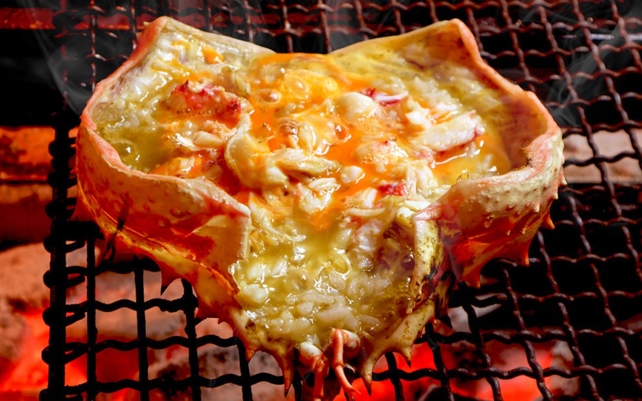 Grilled crab shell with creamy filling at Kiyoyasu House Japanese food experience.