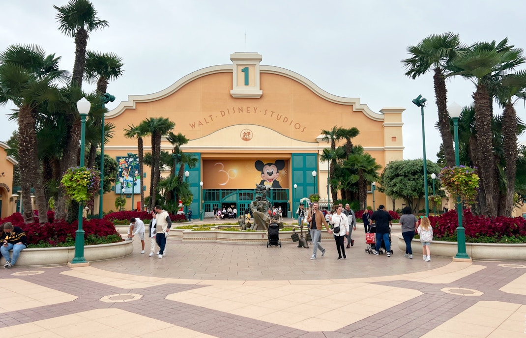Walt Disney Studios entrance at Disneyland Paris with Mickey Mouse mural.