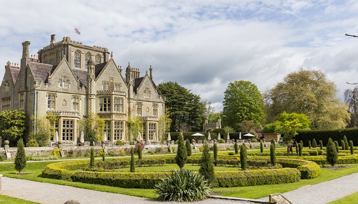 Frogmore House with manicured gardens and historic architecture in the background.