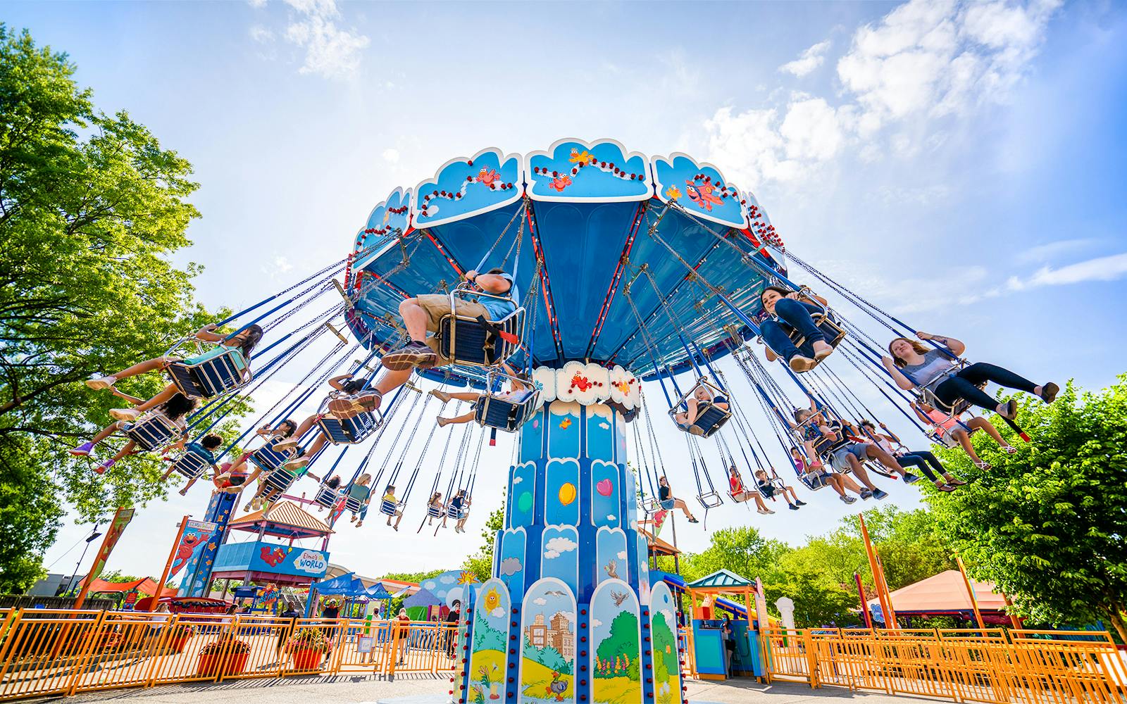 Visitors enjoying a swing ride at Sesame Place Philadelphia.