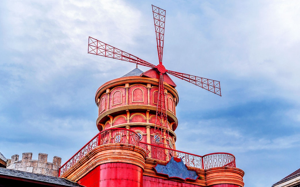 Medieval stone mill with red windmill at Sun World Ba Na Hills.