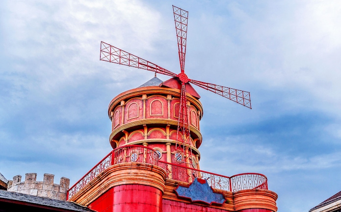 Medieval stone mill with red windmill at Sun World Ba Na Hills.