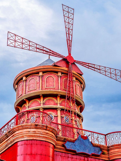 Medieval stone mill with red windmill at Sun World Ba Na Hills.