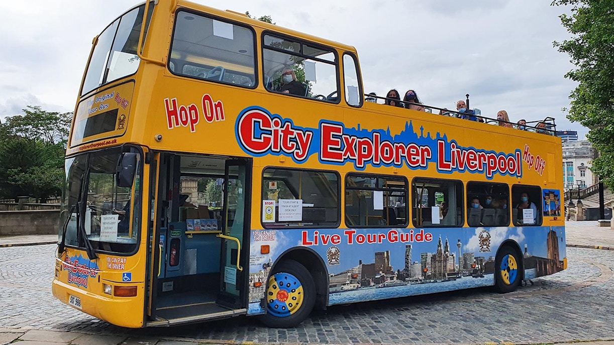 The city Sightseeing Bus which is yellow in colour