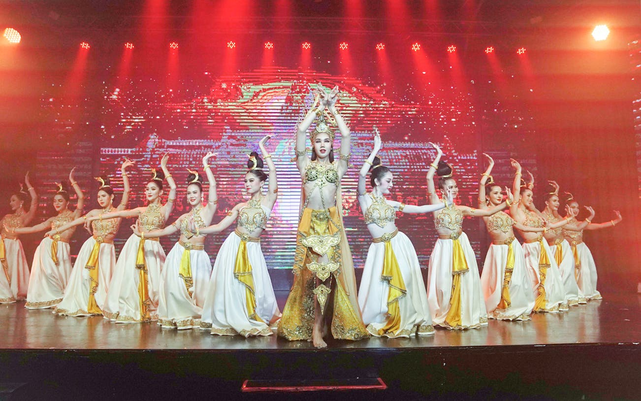 Performers in traditional costumes at Siam Fantasy show, Thailand.