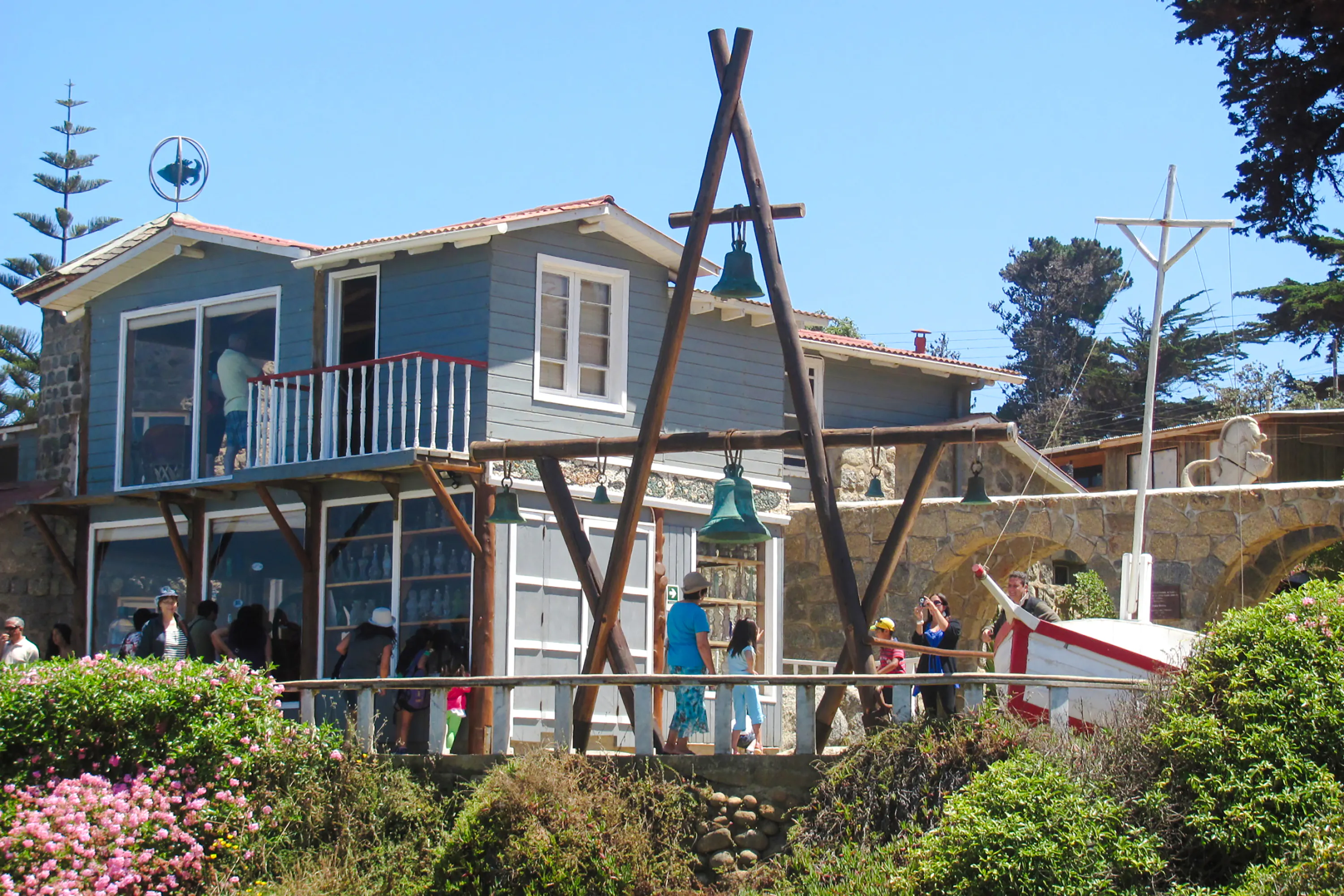 Pablo Neruda's Museum in Isla Negra with visitors exploring the grounds, Santiago.