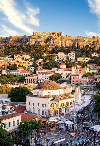 Aerial view of Monastiraki Square and the Acropolis at sunset, Athens, Greece.