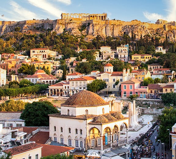 Aerial view of Monastiraki Square and the Acropolis at sunset, Athens, Greece.