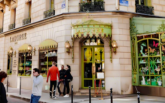 Ladurée storefront in Paris, part of the Arc de Triomphe walking tour with macaron tasting.